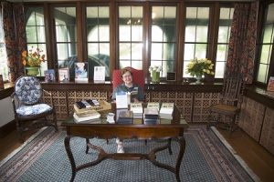 Docents are ready to greet guests into the library of the W.K. Kellogg Manor House