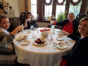 Guests enjoy tea service in the Manor House