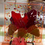 Glass sun catcher with fall leaf